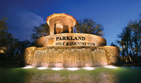 24-Hour staffed stone entrance with waterfalls and botanical gardens