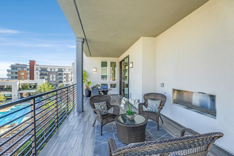 Oversized covered balcony with gas fireplace