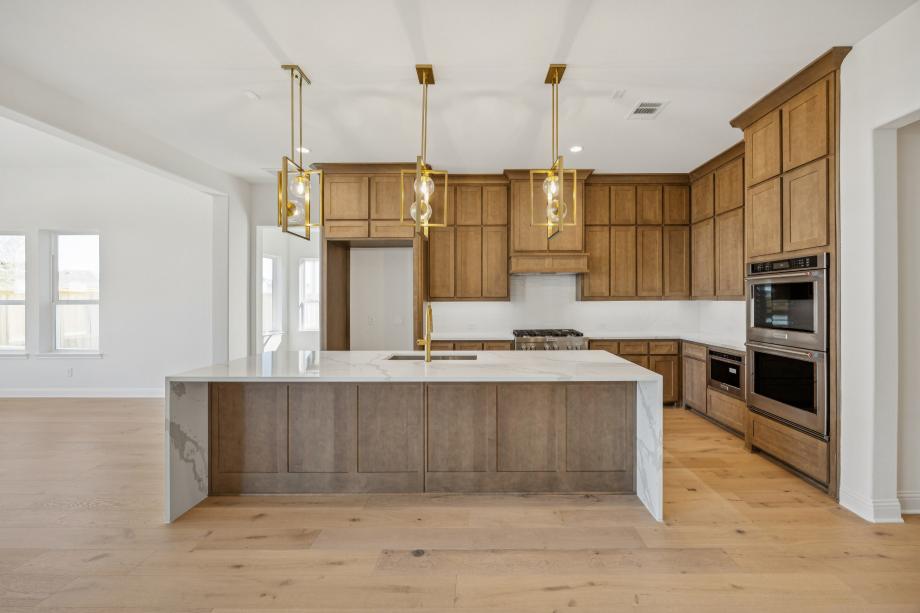 Spacious kitchen with ample cabinet and countertop space