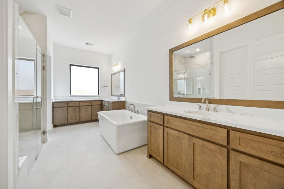 Luxurious primary bath with large soaking tub