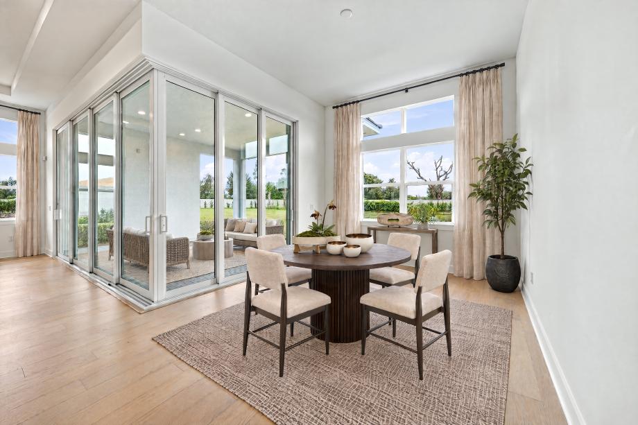 Light-filled casual dining area with seamless access to outdoor living