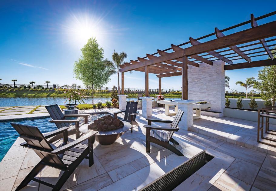 A beautiful rear lanai includes a fire pit, fireplace, private swimming pool, and spa