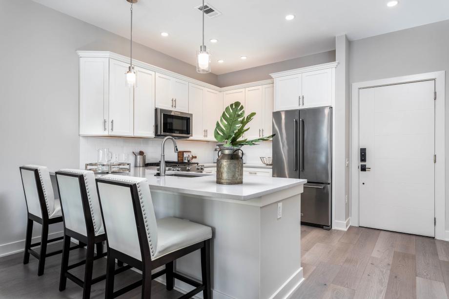 Representative photo: Stylish kitchen features name-brand appliances and Quartz countertops