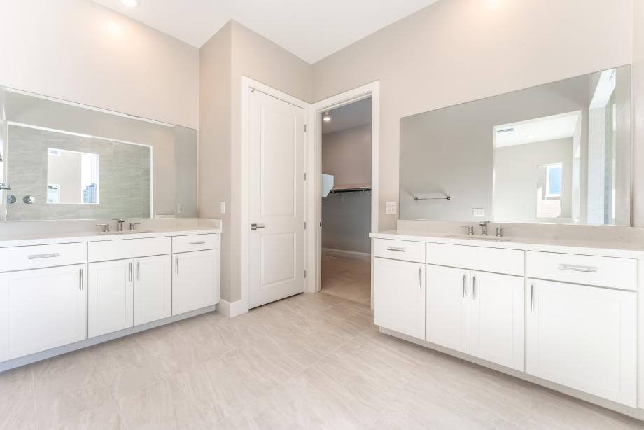 Stunning primary bath with separate vanities