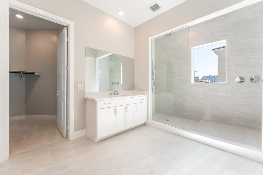 Oversized primary, slab tile surround shower