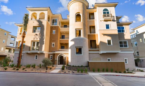 Stunning exterior, gated building entry