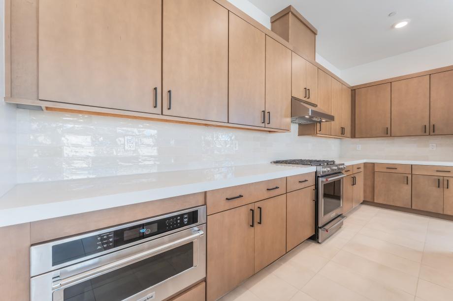 Upgraded hard surface with coordinating subway tile backsplash