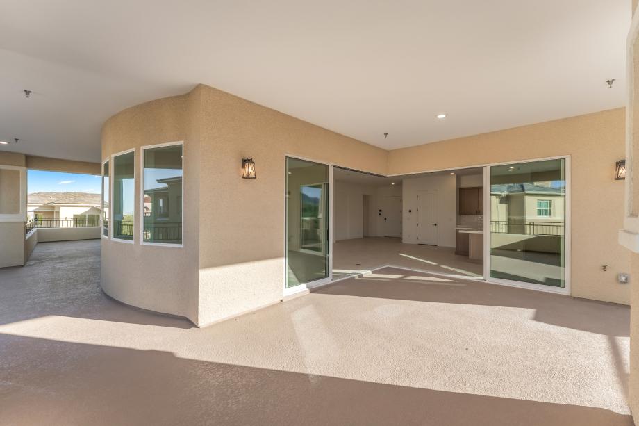 Large corner sliding doors open to wrap around veranda