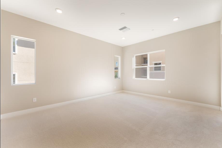 Generous primary bedroom suite