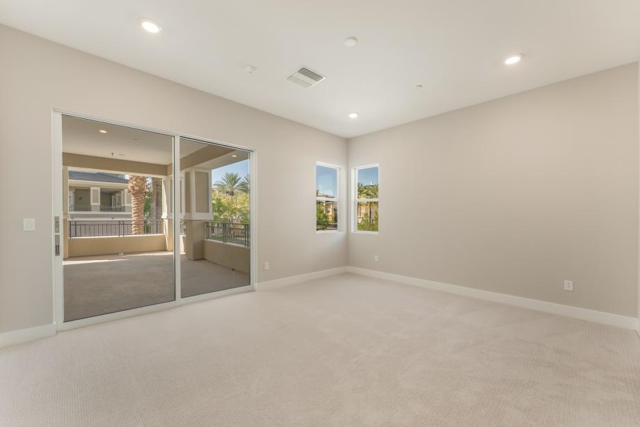 Generous primary bedroom suite with veranda access