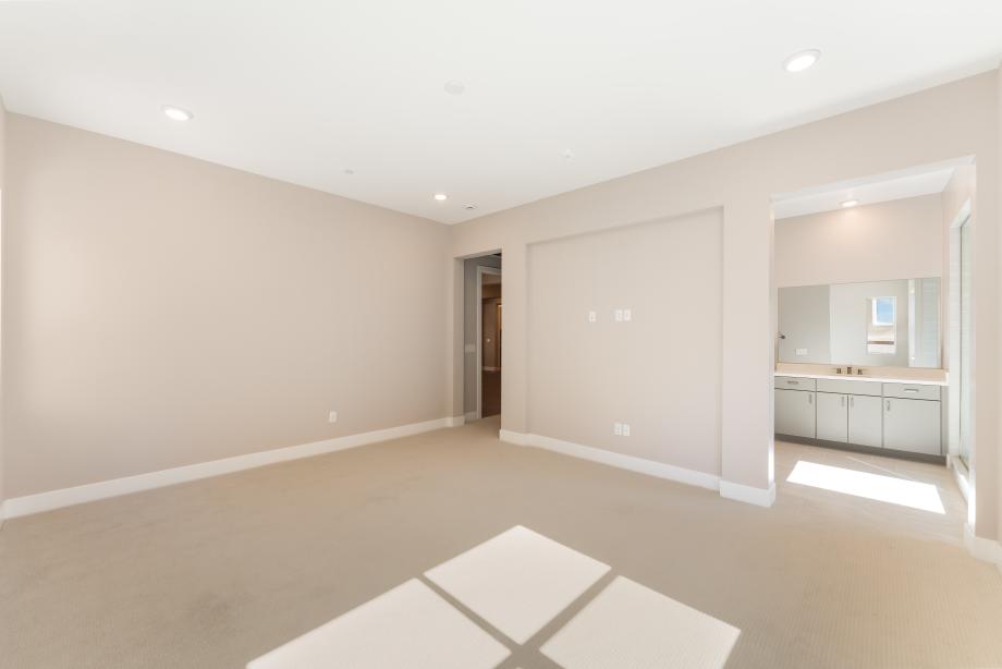 Generous primary bedroom suite