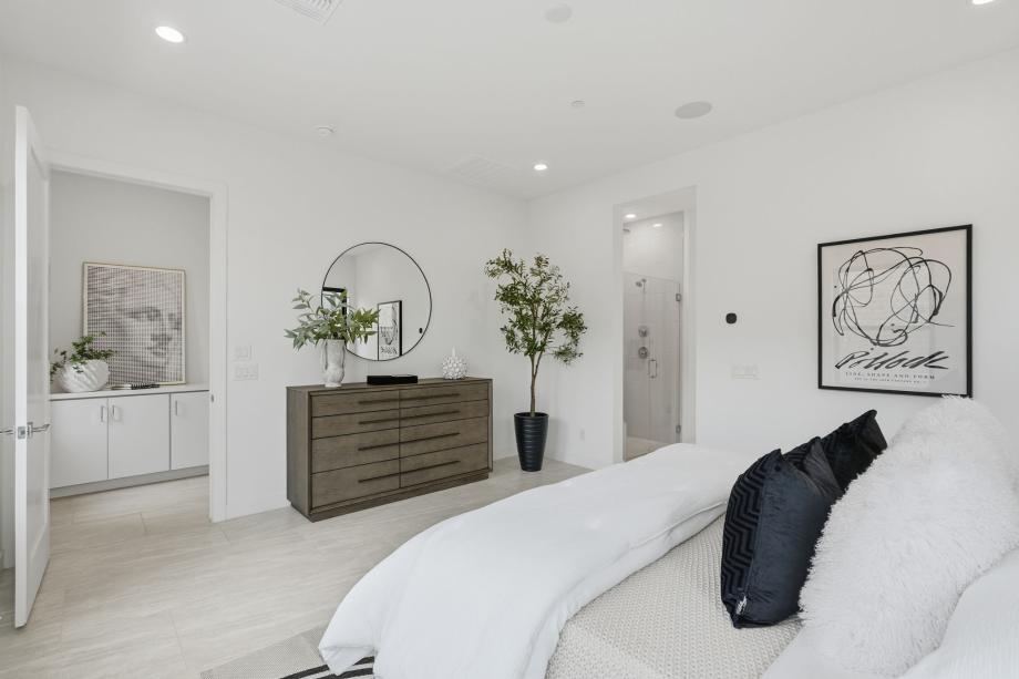 Beautiful primary bedroom suite with ample natural light