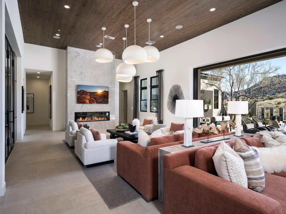 Spacious great rooms with expansive multi-slide doors and soaring ceilings