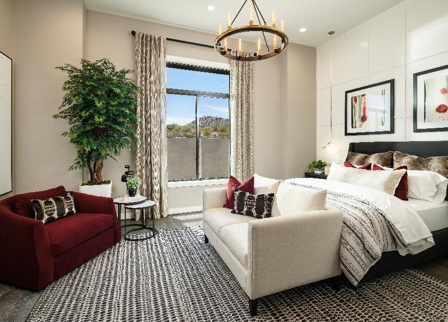 Secondary bedroom with a sitting area