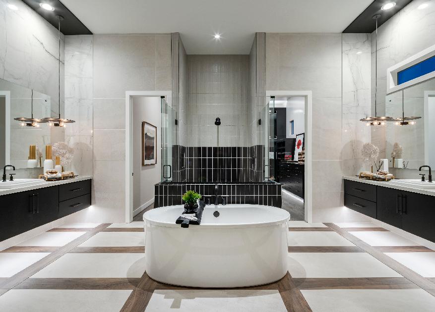 Luxurious primary bathroom with freestanding tub