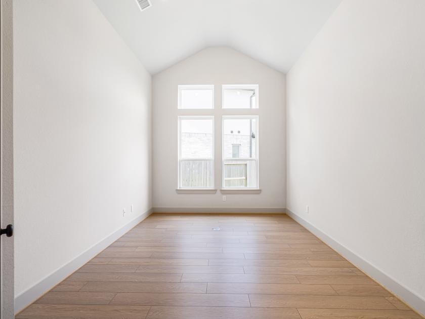 Office with privacy doors and vaulted ceilings