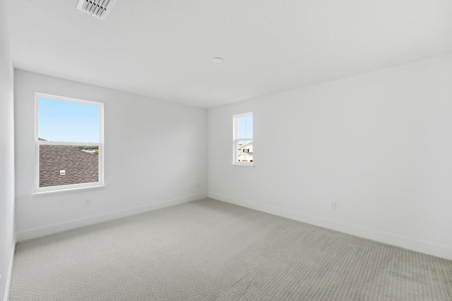 Bright, functional, and inviting secondary bedroom