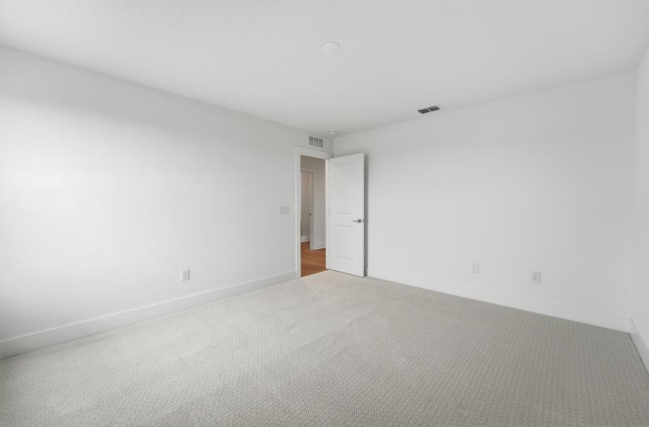 Comfortable, welcoming, and thoughtfully designed secondary bedroom