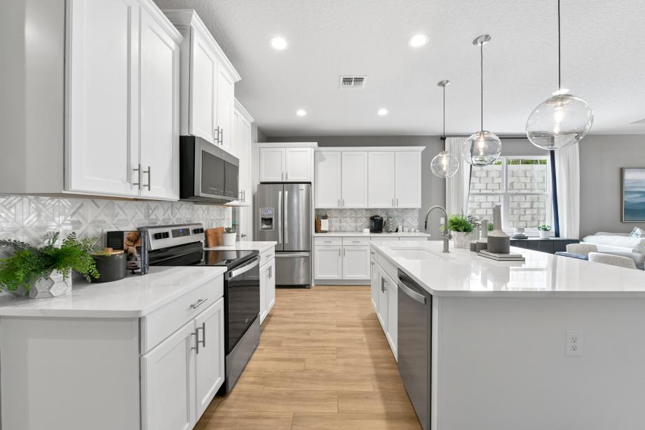 The kitchen is a stunning centerpiece of the home