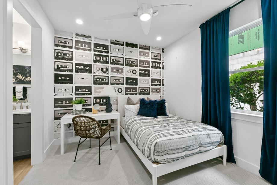 Well-appointed and versatile, the secondary bedroom offers comfort, privacy, and timeless appeal