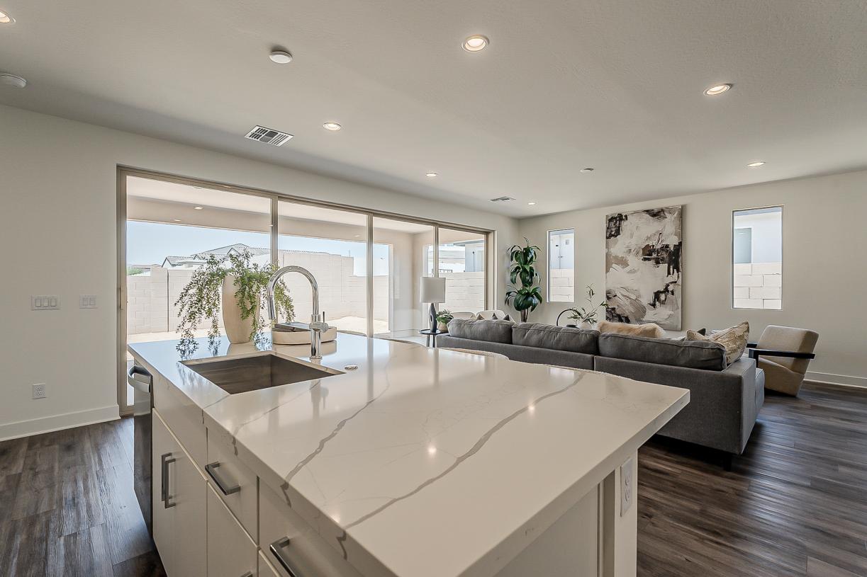 Great room seamlessly flows into expansive kitchen
