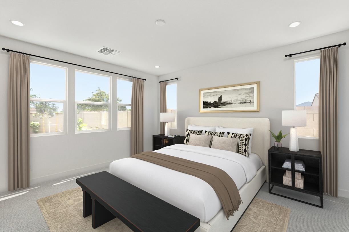 Serene primary bedroom suite with neutral finishes