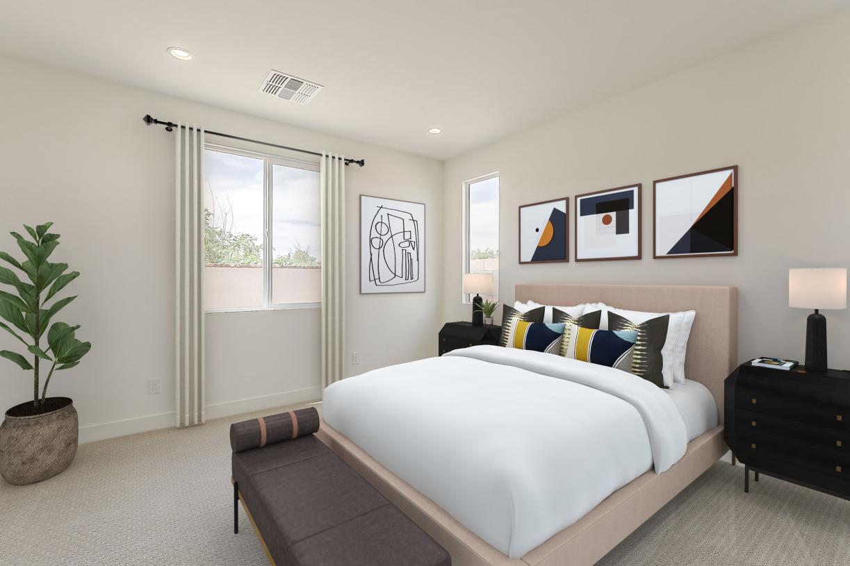 Primary bedroom suite with stunning fixtures and an abundance of natural light