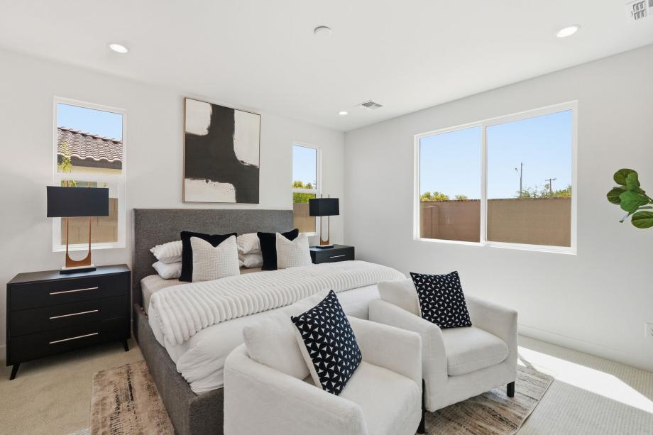 Expansive primary bedroom with luxurious finishes