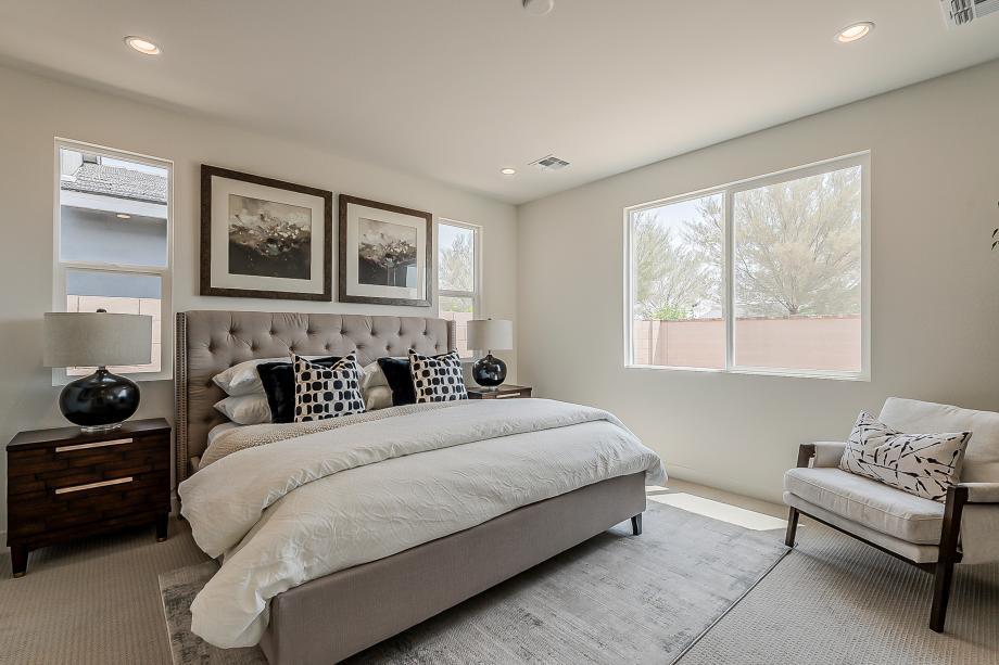 Beautiful primary bedroom suite with ample natural light