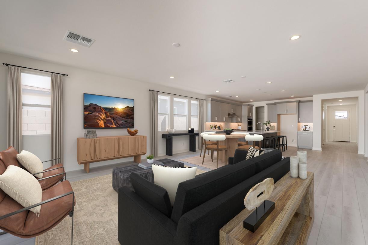 Great room seamlessly flows into casual dining area and expansive kitchen