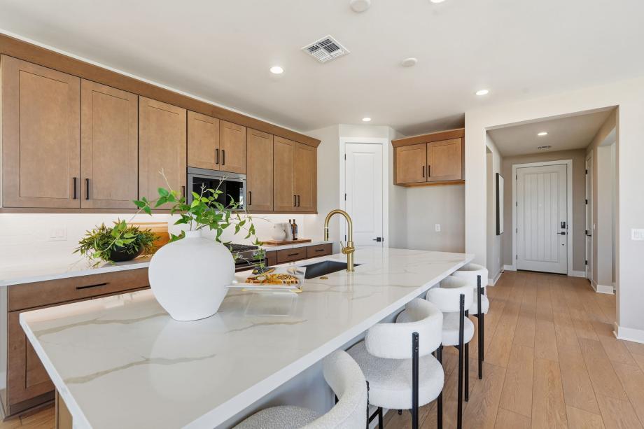 Well-appointed kitchen with beautiful cabinets and large island