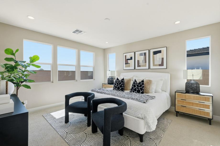 Expansive primary bedroom with luxurious finishes