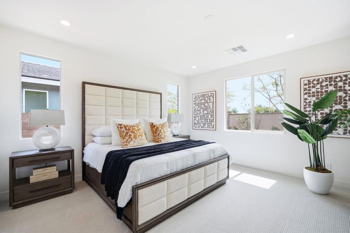 Primary bedroom suite with stunning fixtures and an abundance of natural light