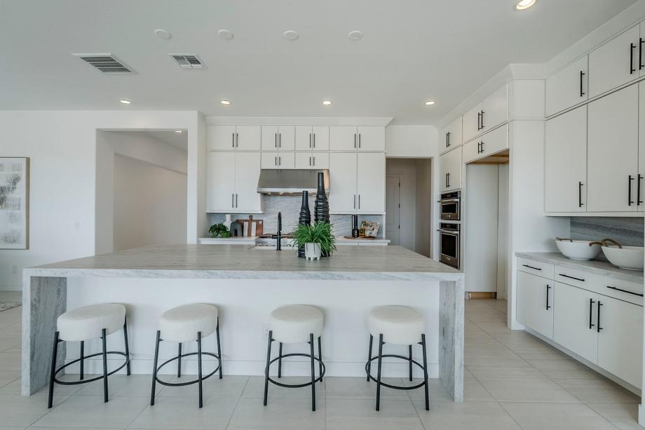 Kitchen area with ample cabinet space and large island