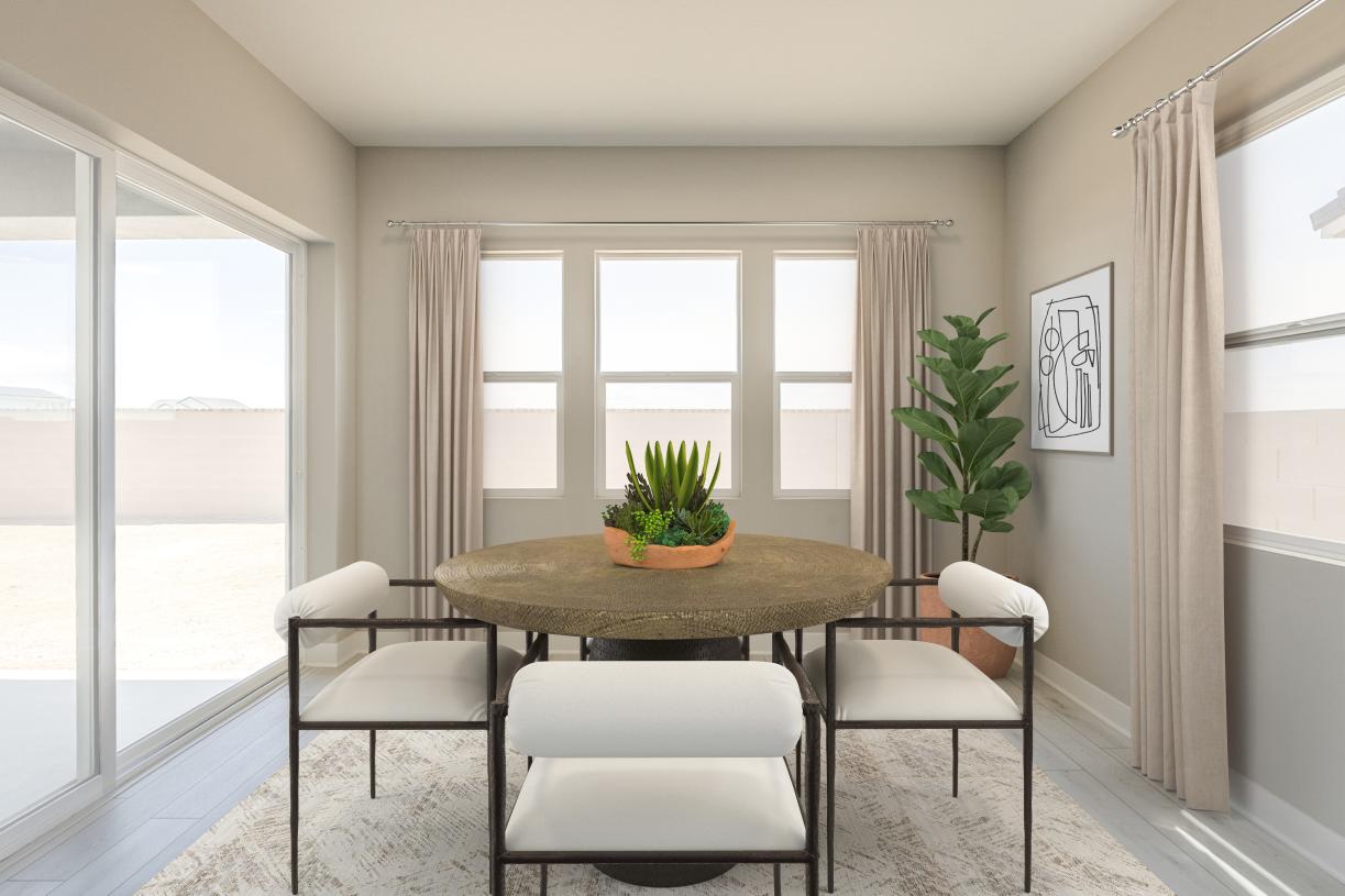 Stunning casual dining area with ample natural light and direct patio access