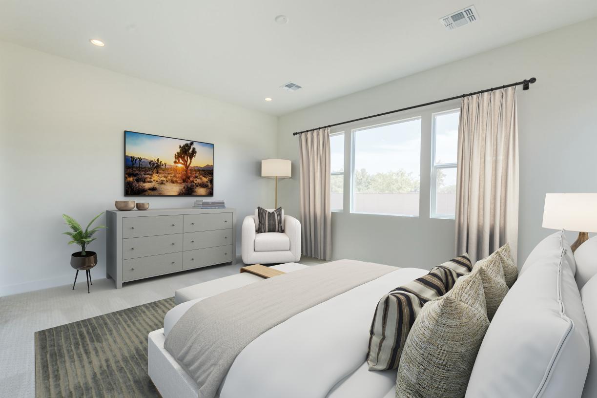 Primary bathroom with glass shower door and standalone soaking tub