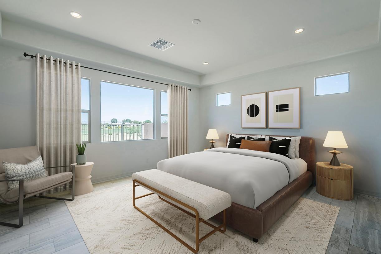 Primary bedroom suite with stunning fixtures, golf course views, and an abundance of natural light