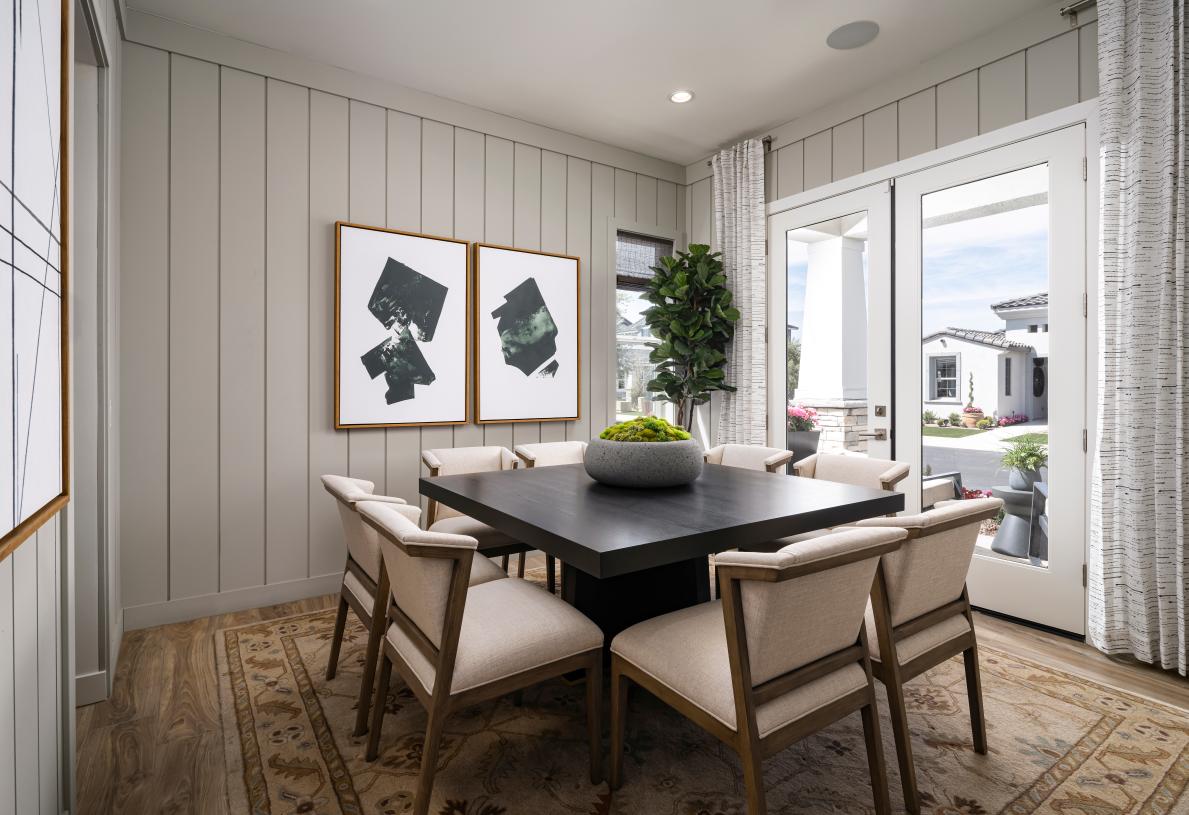 Inviting open dining room with direct front porch access