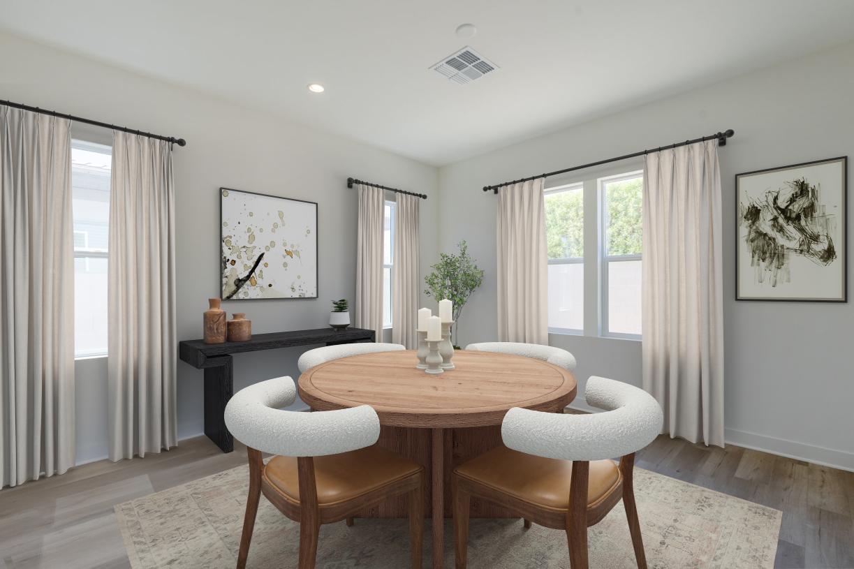 Stunning casual dining area with ample natural light and direct patio access