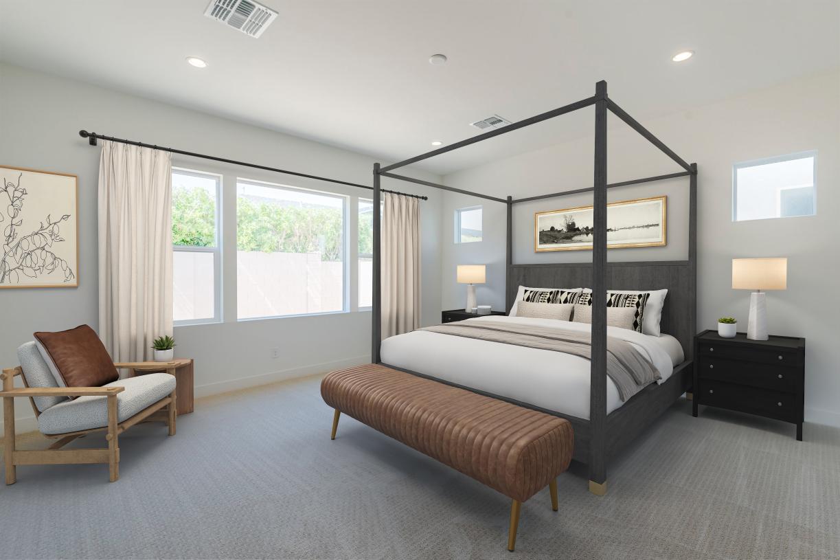 Expansive primary bedroom with luxurious finishes
