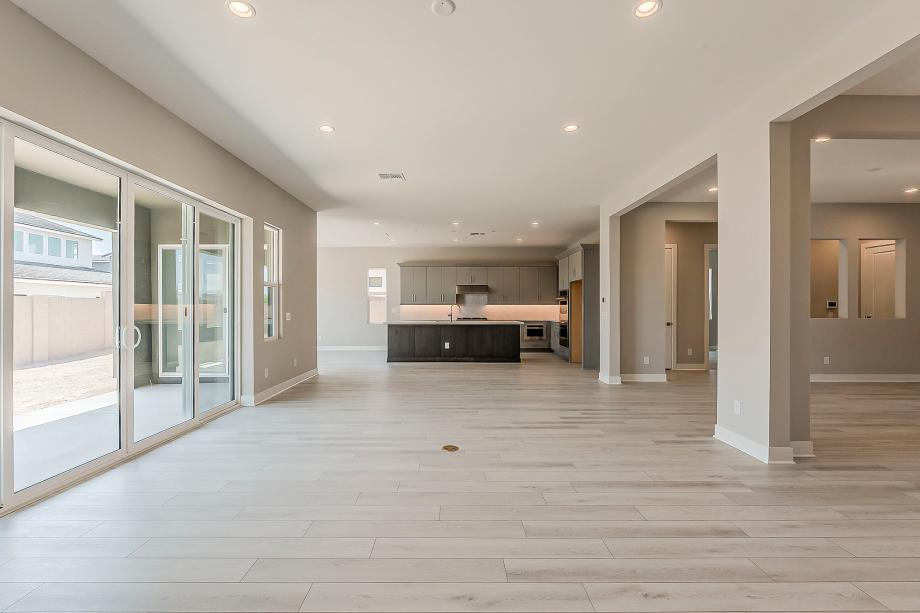 Spacious great room seamlessly leads into casual dining area and kitchen