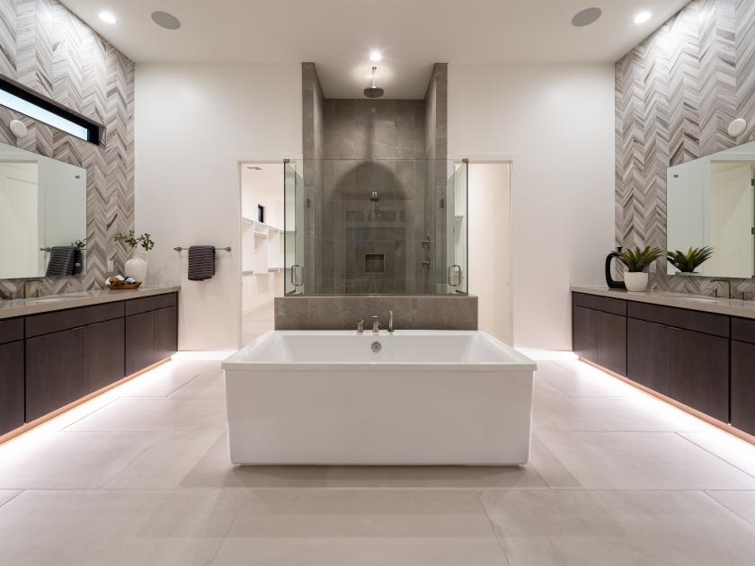 Stunning primary bathroom with dual vanities and ample cabinet space