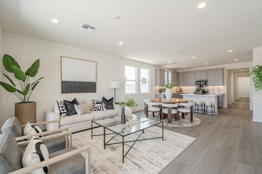 Great room seamlessly flows into casual dining area and kitchen