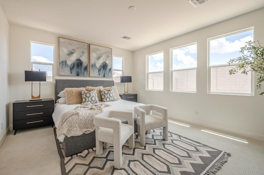 Expansive primary bedroom with luxurious finishes