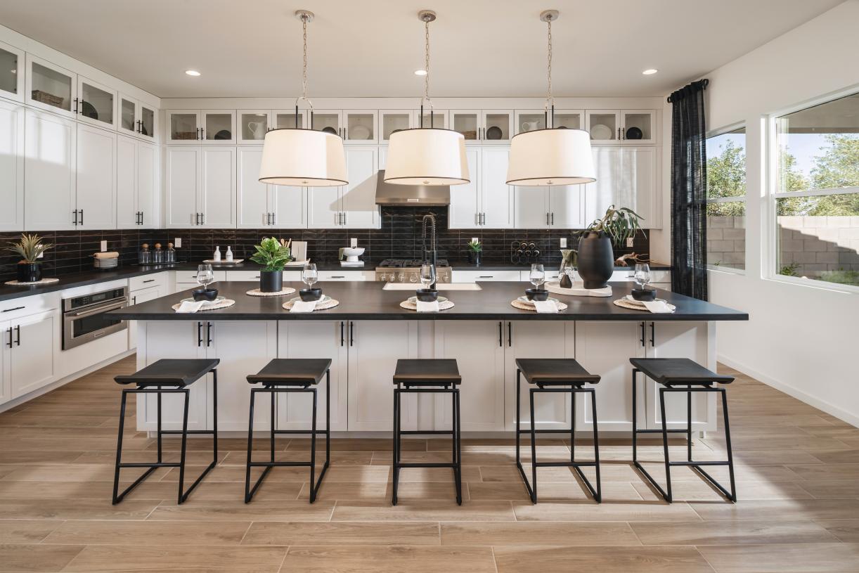 Gorgeous kitchens with ample countertop and cabinet space with spacious center islands