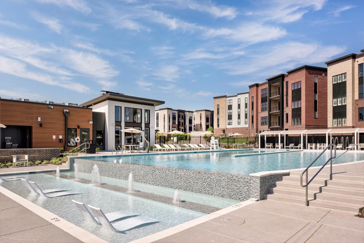 Swimming pool with sun deck and cabanas
