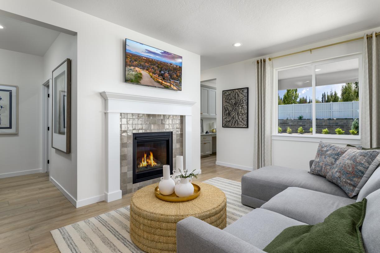 Inviting great rooms include a gorgeous fireplace with a tile surround