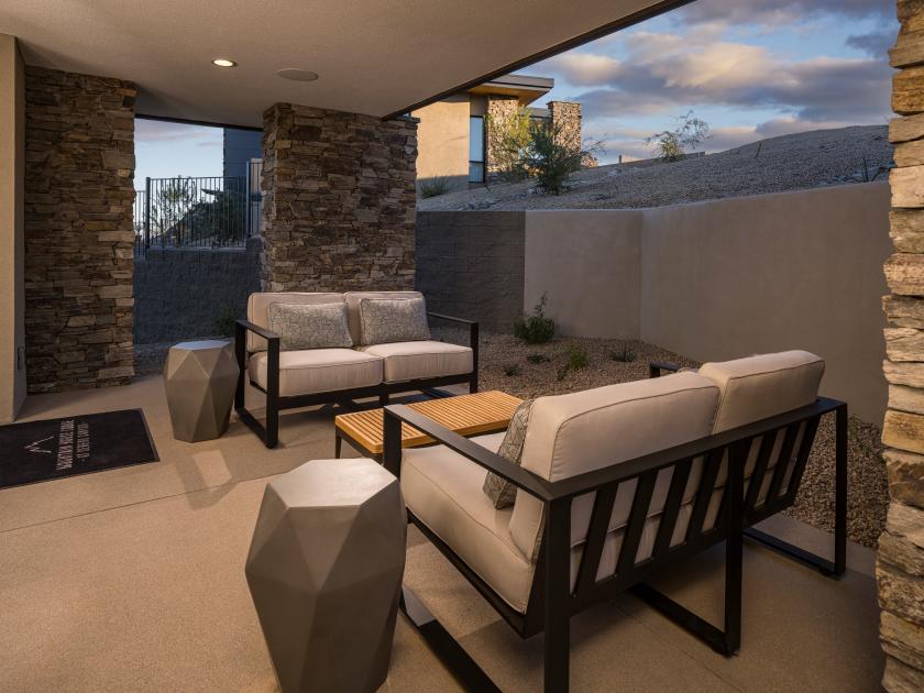 Private covered patio accessible from the primary bedroom