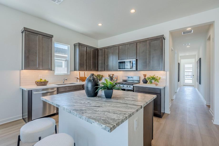 Beautiful kitchen with upgraded cabinets and beautiful tile backsplash
