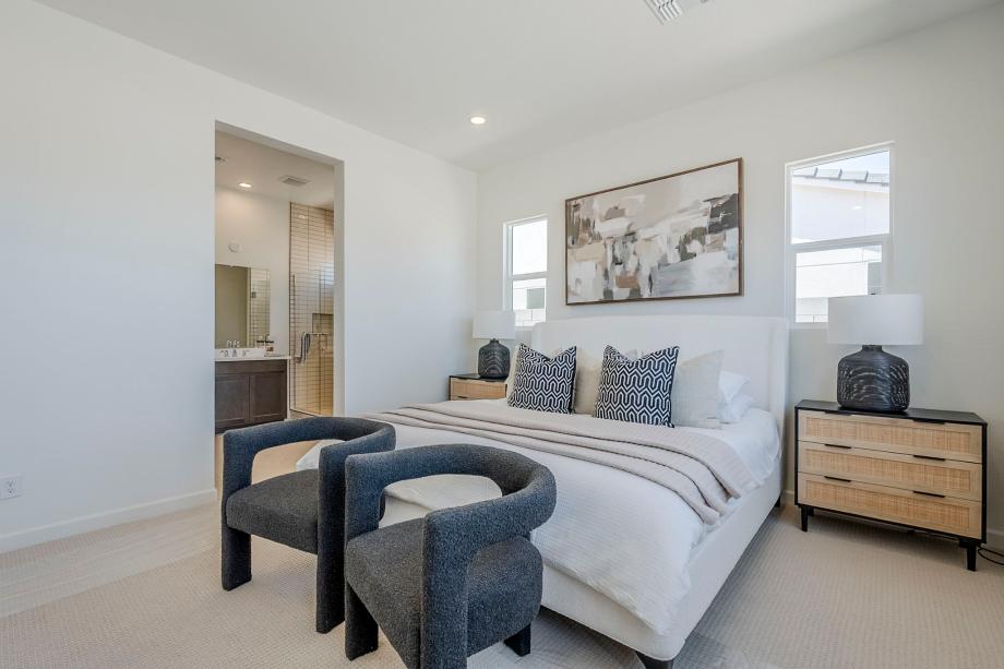 Beautiful primary bedroom suite with ample natural light